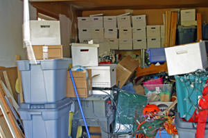 Cluttered garage in need of garage organization